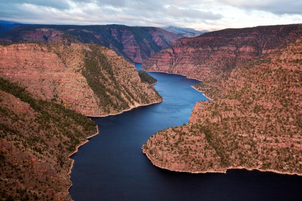 aerial photo of the Colorado River at Flaming Gorge snaking through a canyon