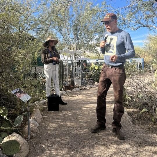 Two people leading a green infrastructure tour in Tuscon, Arizona.