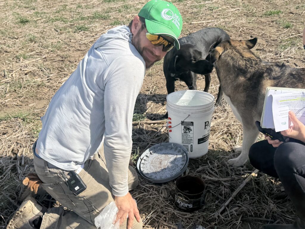 nebraska farmer, Graham Christensen doing soil testing